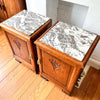 A Pair Of Continental Bedside Cabinets With Marble Tops