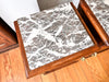 A Pair Of Continental Bedside Cabinets With Marble Tops