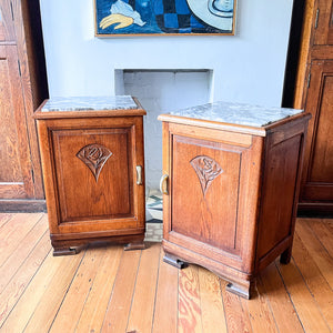 A Pair Of Continental Bedside Cabinets With Marble Tops