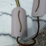 Load image into Gallery viewer, A Pair Of Mid Century Brass Swedish Wall Lights With Pale Lilac Perforated Metal Shades
