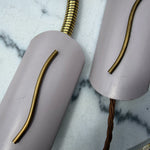 Load image into Gallery viewer, A Pair Of Mid Century Brass Swedish Wall Lights With Pale Lilac Perforated Metal Shades

