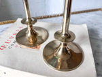 Load image into Gallery viewer, A Pair Of Vintage Brass Candlesticks
