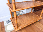 Load image into Gallery viewer, Vintage Faux Bamboo And Cane Console / Shelving Unit On Castors
