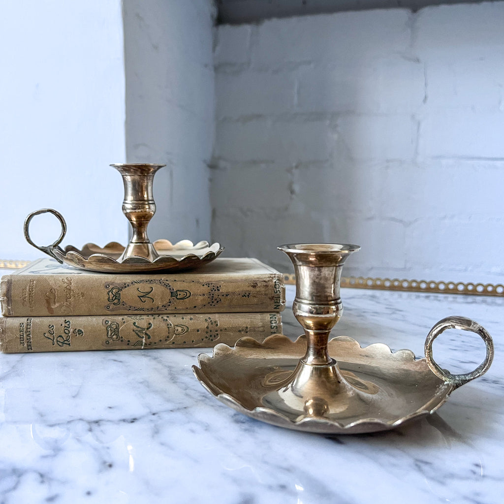 A Pair Of Vintage Brass Scalloped Chamber Sticks