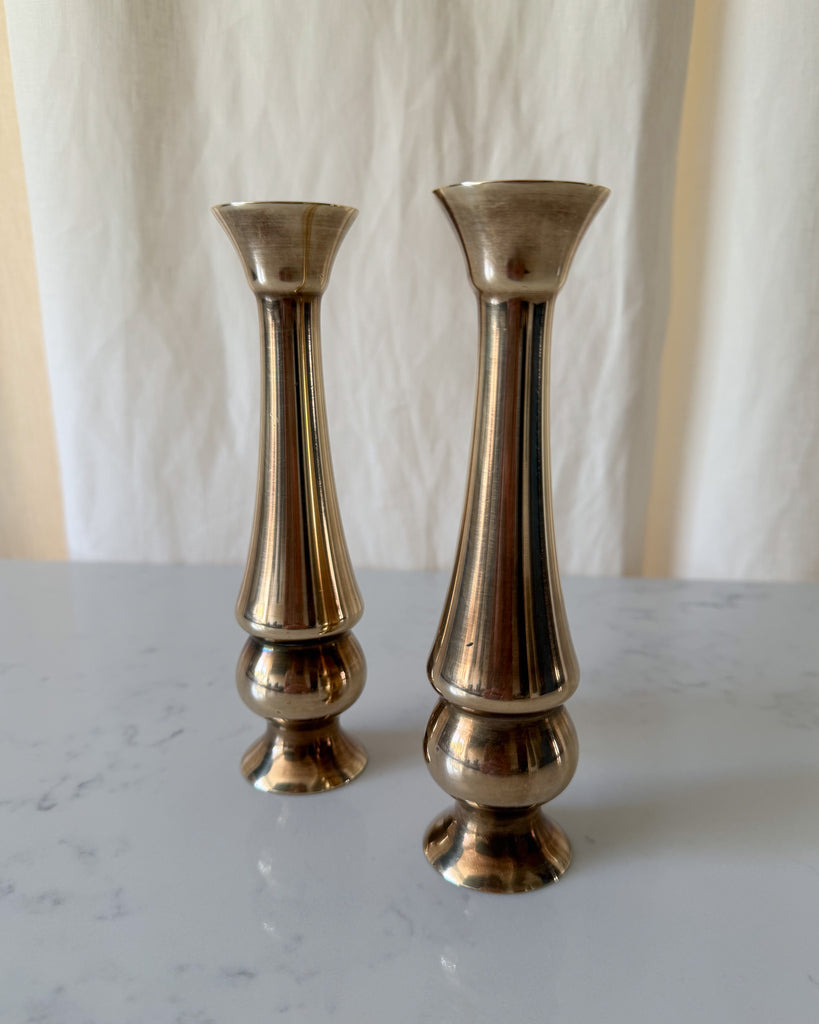 A Pair Of Vintage Bronze Candlesticks