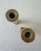 A Pair Of Vintage Bronze Candlesticks