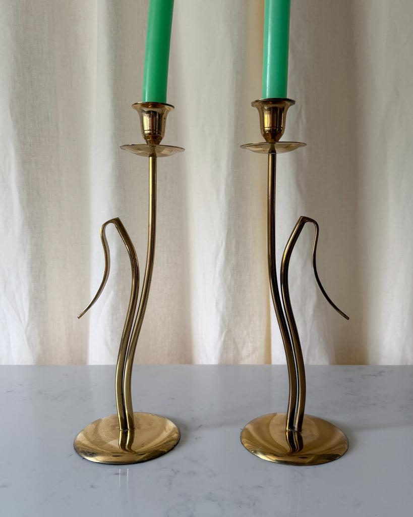 A Pair Of Tall Mid Century Brass Candlesticks