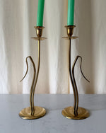 Load image into Gallery viewer, A Pair Of Tall Mid Century Brass Candlesticks
