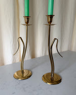 Load image into Gallery viewer, A Pair Of Tall Mid Century Brass Candlesticks
