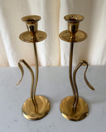 Load image into Gallery viewer, A Pair Of Tall Mid Century Brass Candlesticks
