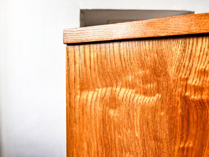 A Pair Of Art Deco Maple Bedside Cabinets