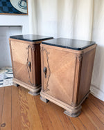 Load image into Gallery viewer, A Pair Of Continental Art Deco Bedside Cabinets With Marble Tops
