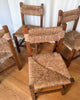 Set Of Four French Rustic Dining Chairs With Rush Seats In The Manner Of Charlotte Perriand