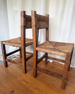 Load image into Gallery viewer, Set Of Four French Rustic Dining Chairs With Rush Seats In The Manner Of Charlotte Perriand
