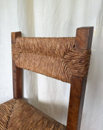 Load image into Gallery viewer, Set Of Four French Rustic Dining Chairs With Rush Seats In The Manner Of Charlotte Perriand
