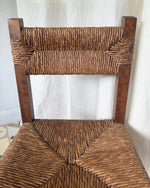 Load image into Gallery viewer, Set Of Four French Rustic Dining Chairs With Rush Seats In The Manner Of Charlotte Perriand
