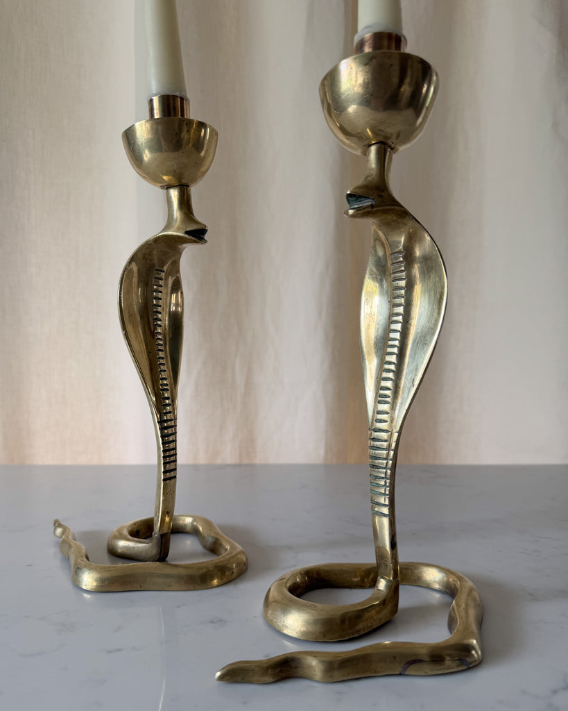 A Pair Of Mid Century Hollywood Regency Brass Cobra Candlesticks