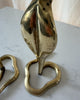 A Pair Of Mid Century Hollywood Regency Brass Cobra Candlesticks