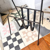 Mid Century Black Iron Magazine Rack With Brass Handle Attributed To Jacques Adnet