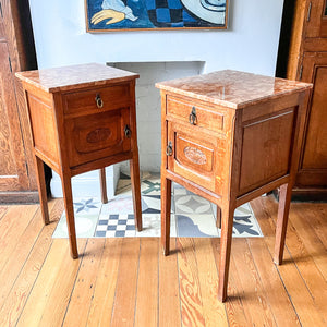 A Pair Of Continental Bedside Cabinets With Marble Tops