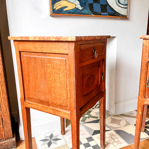 A Pair Of Continental Bedside Cabinets With Marble Tops