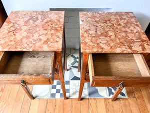 A Pair Of Continental Bedside Cabinets With Marble Tops