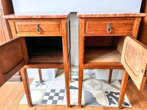 A Pair Of Continental Bedside Cabinets With Marble Tops