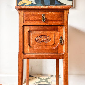 A Pair Of Continental Bedside Cabinets With Marble Tops