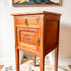 A Pair Of Continental Bedside Cabinets With Marble Tops