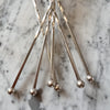 A Set Of Six Long Silver Plated Dessert Spoons