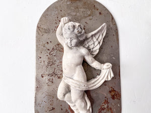 A Pair Of Swedish Metal Cherub Candle Sconces