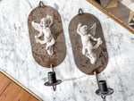 Load image into Gallery viewer, A Pair Of Swedish Metal Cherub Candle Sconces
