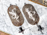 Load image into Gallery viewer, A Pair Of Swedish Metal Cherub Candle Sconces
