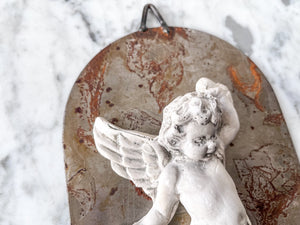 A Pair Of Swedish Metal Cherub Candle Sconces