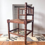 Load image into Gallery viewer, Antique Corner Bobbin Chair With Rush Seat
