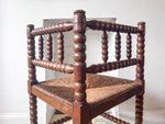 Load image into Gallery viewer, Antique Corner Bobbin Chair With Rush Seat
